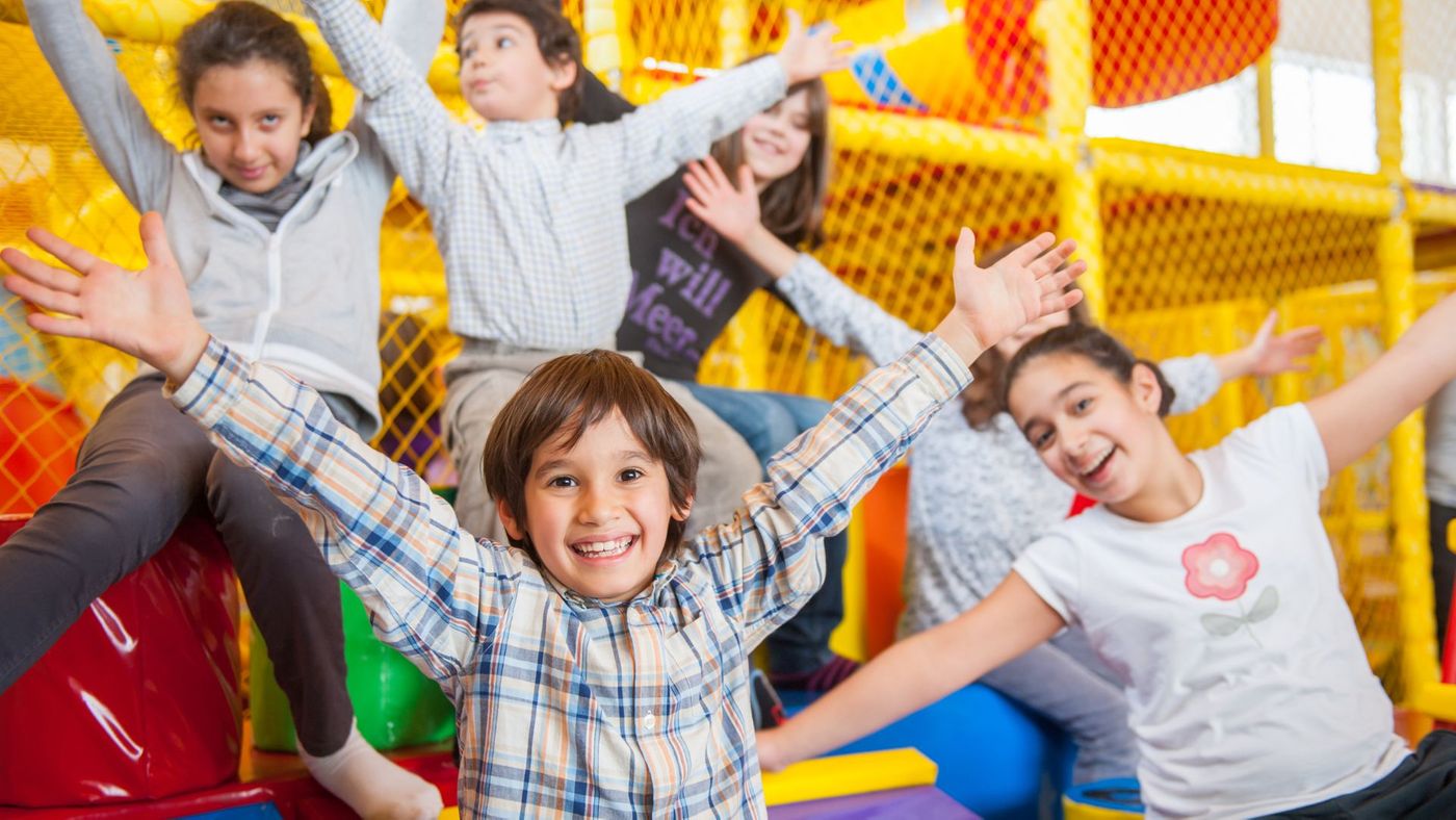 Four children in an inflatable castle. 