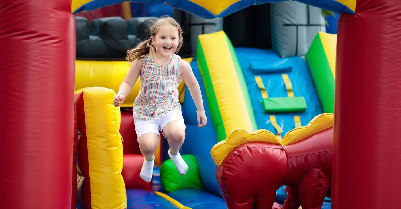 Four children in an inflatable castle. 