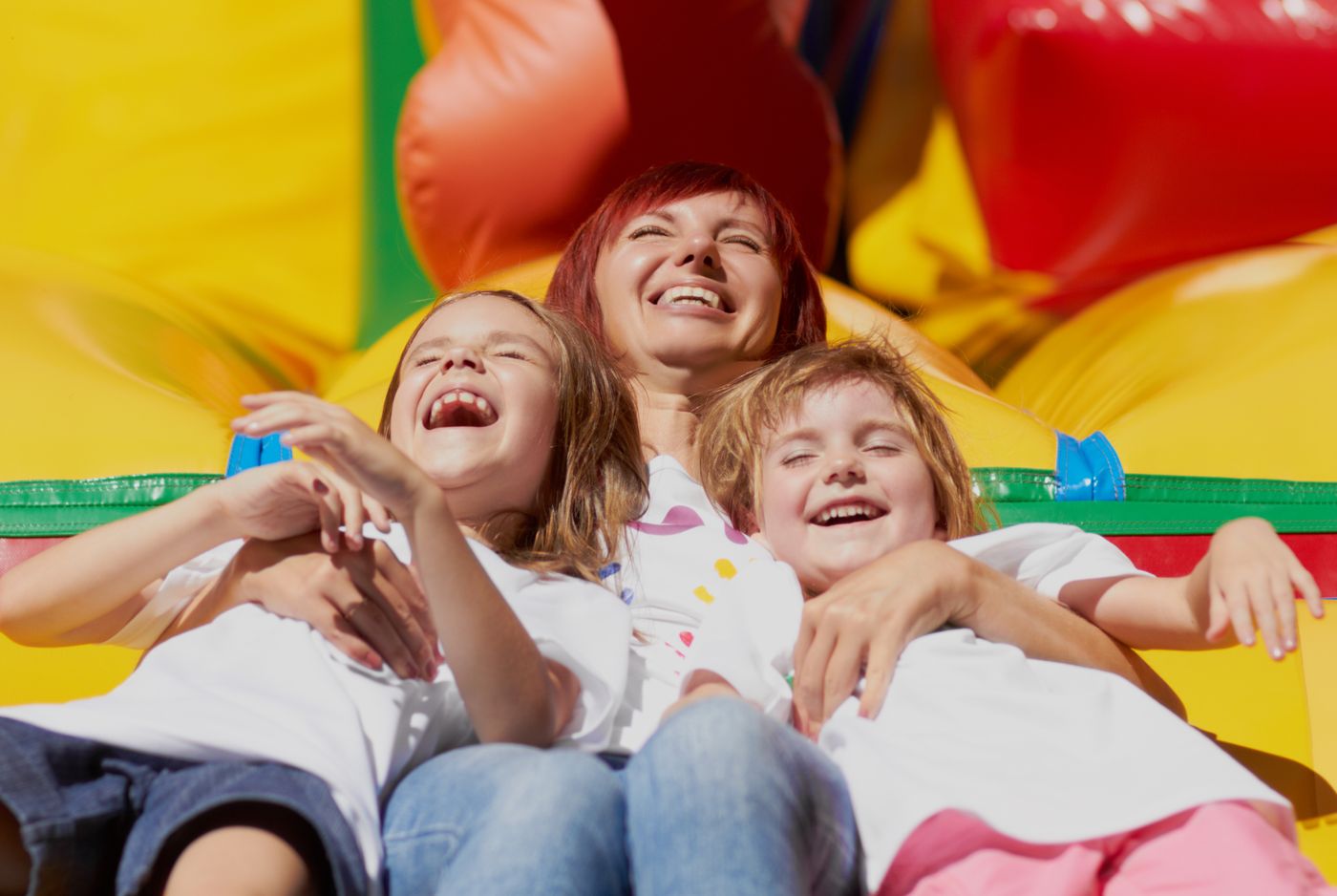 Four children in an inflatable castle. 